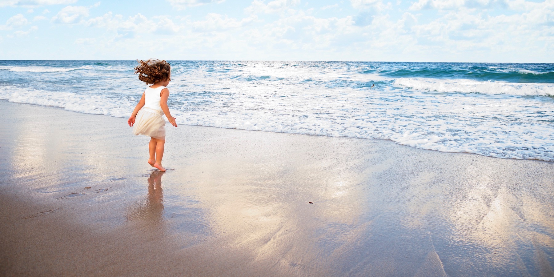 girl at beach, catching wave, Florida creative family children photography Miami Sarasota Tampa Atlanta